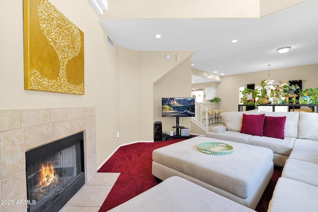 carpeted living room with a fireplace