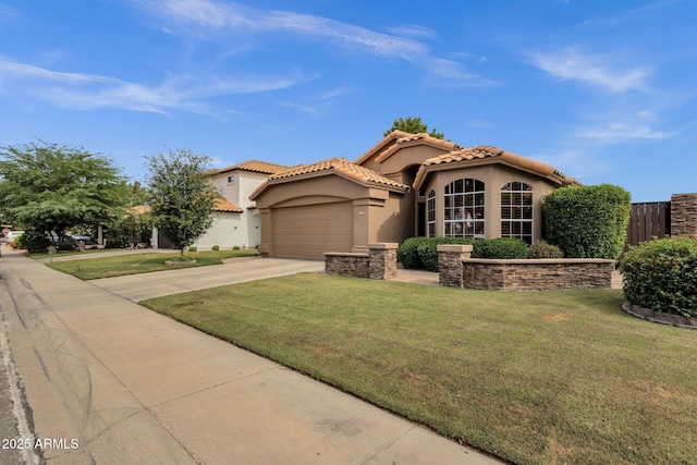 1558 W Maplewood St, Chandler, AZ 85286 - mediterranean / spanish home featuring stucco siding, concrete driveway, an attached garage, and a tiled roof