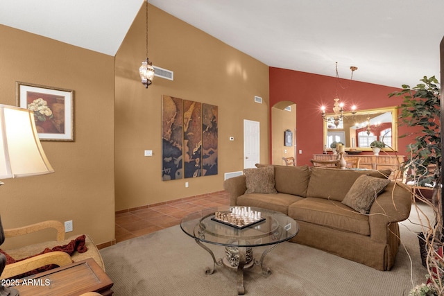 1558 W Maplewood St, Chandler, AZ 85286 - living area with a chandelier, tile patterned flooring, and high vaulted ceiling