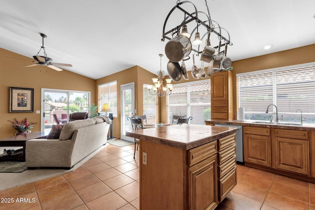 1558 W Maplewood St, Chandler, AZ 85286 - kitchen with a sink, a chandelier, stainless steel dishwasher, healthy amount of natural light, and lofted ceiling