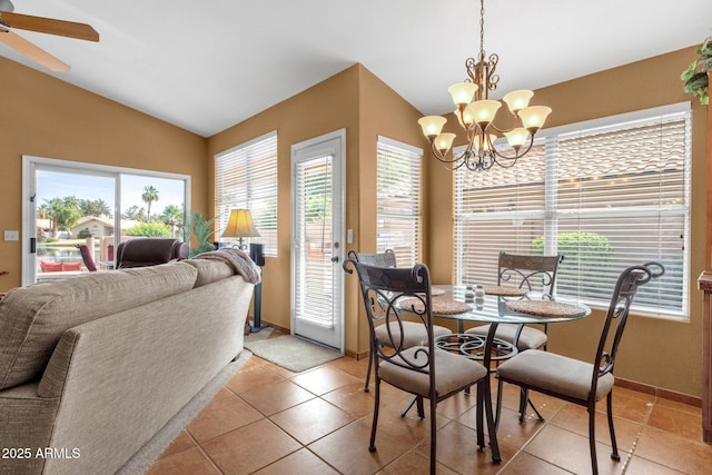 1558 W Maplewood St, Chandler, AZ 85286 - dining room featuring vaulted ceiling, a chandelier, light tile patterned flooring, a ceiling fan, and baseboards