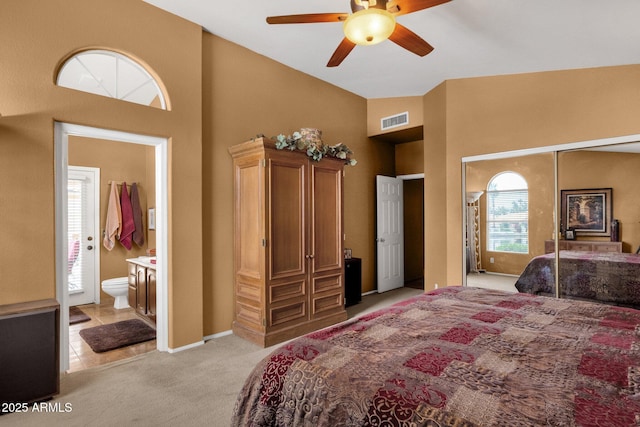 1558 W Maplewood St, Chandler, AZ 85286 - bedroom featuring high vaulted ceiling, light carpet, ensuite bath, baseboards, and ceiling fan