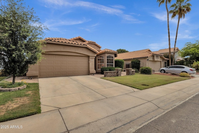 1558 W Maplewood St, Chandler, AZ 85286 - mediterranean / spanish-style house with an attached garage, stucco siding, a front yard, concrete driveway, and a tile roof
