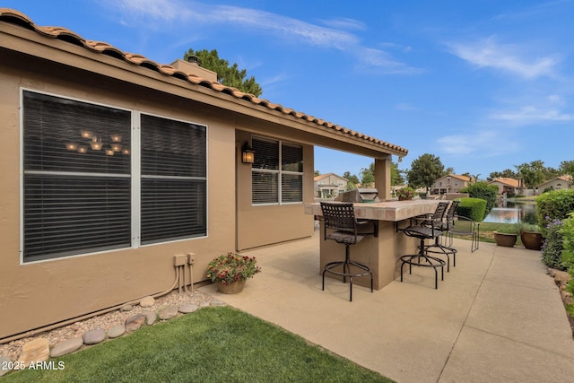 1558 W Maplewood St, Chandler, AZ 85286 - view of patio with a water view