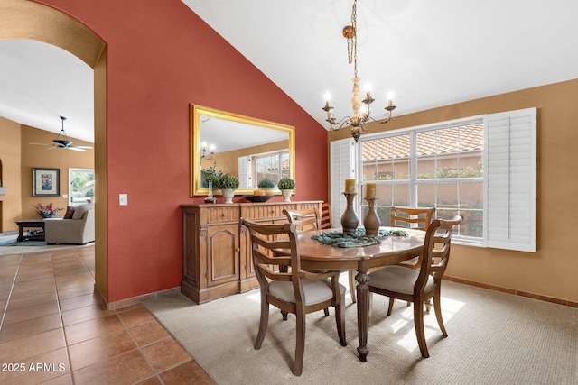 1558 W Maplewood St, Chandler, AZ 85286 - dining space with healthy amount of natural light, arched walkways, a chandelier, baseboards, and high vaulted ceiling