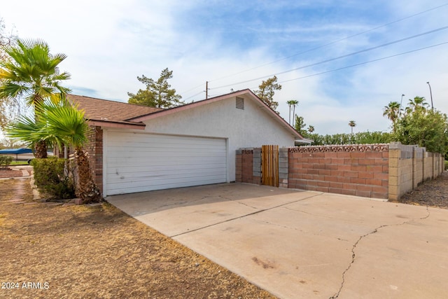 view of home's exterior featuring a garage