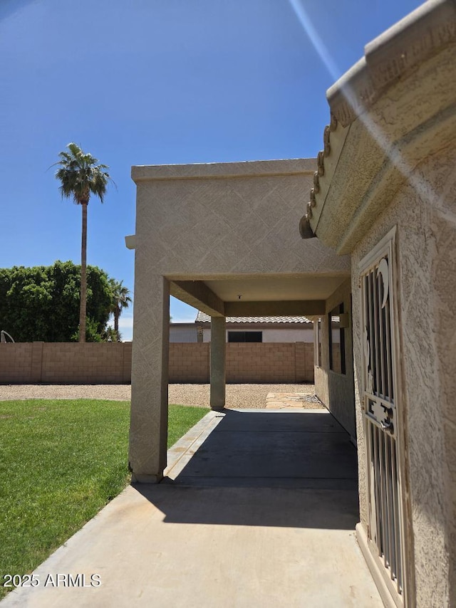 14621 W Catalina Dr, Goodyear, AZ 85395 - fenced backyard with a patio area