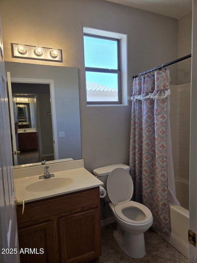 14621 W Catalina Dr, Goodyear, AZ 85395 - bathroom featuring vanity, shower / tub combo, and tile patterned flooring