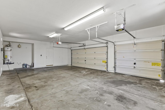 14621 W Catalina Dr, Goodyear, AZ 85395 - garage featuring a garage door opener and strapped water heater