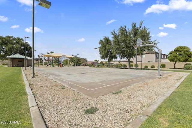 14621 W Catalina Dr, Goodyear, AZ 85395 - view of sport court featuring community basketball court and a yard