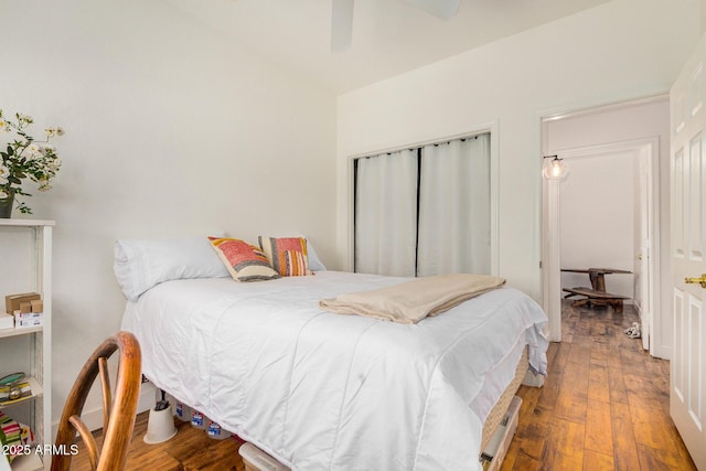 bedroom featuring ceiling fan and wood finished floors