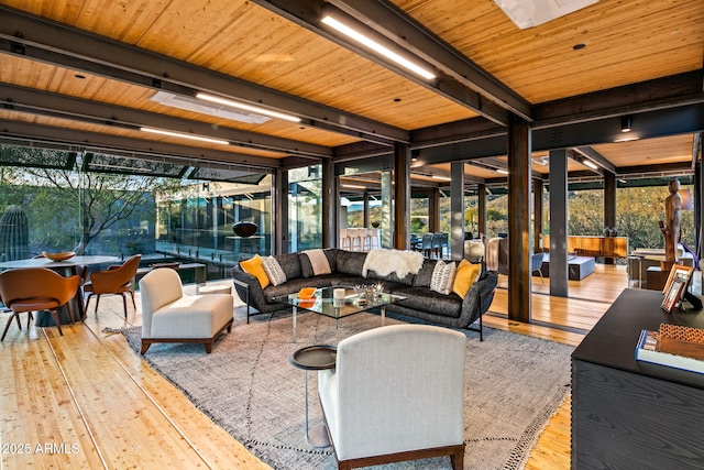 sunroom with wood ceiling and beamed ceiling