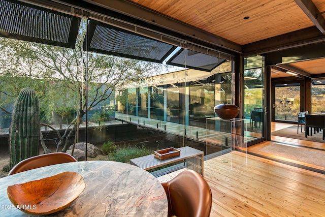 sunroom with wood ceiling