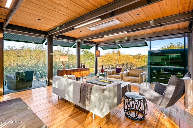 interior space with wooden ceiling and visible vents