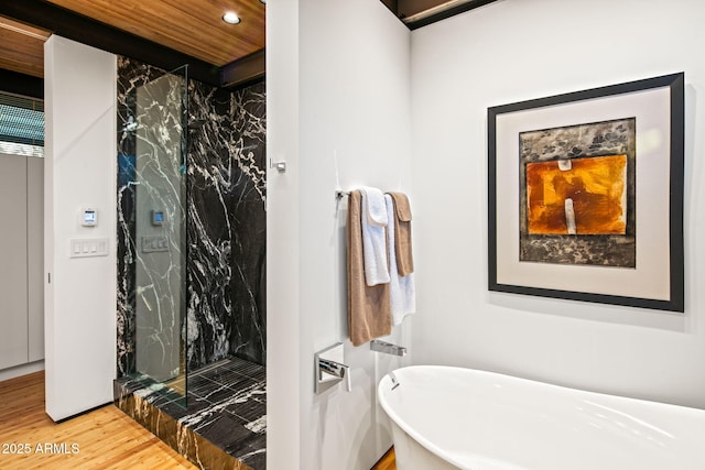 bathroom with hardwood / wood-style floors, wooden ceiling, and independent shower and bath