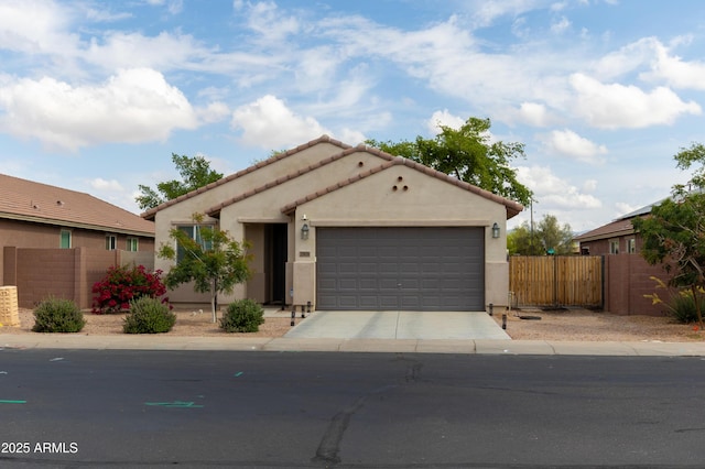 ranch-style house with a garage, a tiled roof, stucco siding, fence, and driveway