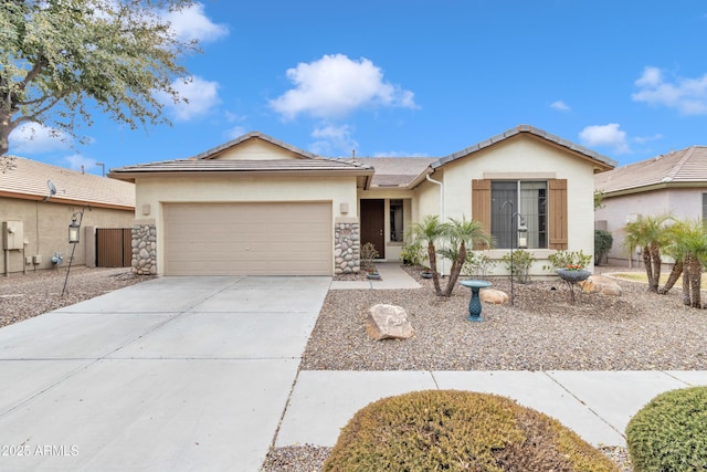 ranch-style house featuring a garage