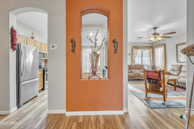 hallway with light wood-type flooring