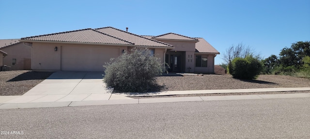 view of front of home with a garage