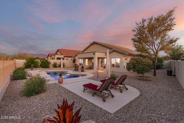 17562 W Desert Sage Dr, Goodyear, AZ 85338 - view of pool with a fenced backyard and a patio area