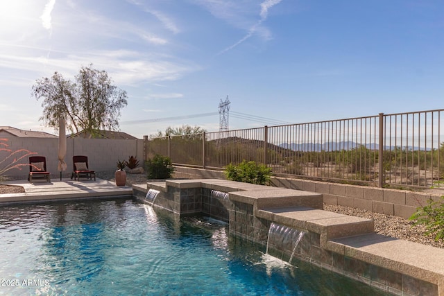 17562 W Desert Sage Dr, Goodyear, AZ 85338 - view of swimming pool with a fenced backyard and a patio