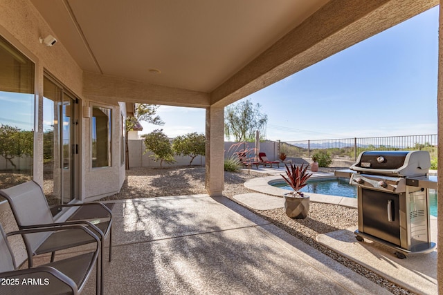 17562 W Desert Sage Dr, Goodyear, AZ 85338 - fenced backyard with grilling area and a patio area