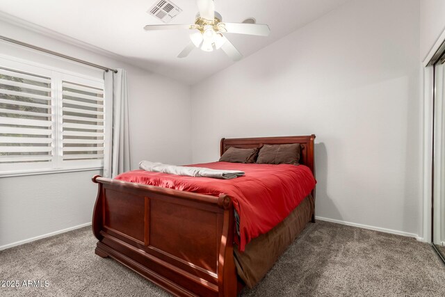 17562 W Desert Sage Dr, Goodyear, AZ 85338 - bedroom with carpet flooring, vaulted ceiling, baseboards, and ceiling fan