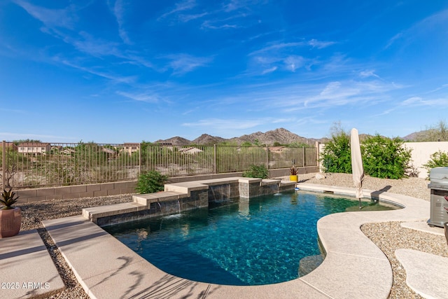 17562 W Desert Sage Dr, Goodyear, AZ 85338 - view of pool featuring a fenced backyard and a mountain view