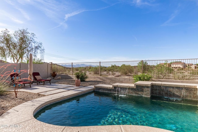17562 W Desert Sage Dr, Goodyear, AZ 85338 - view of swimming pool featuring a fenced backyard and a patio