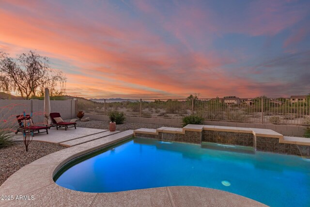 17562 W Desert Sage Dr, Goodyear, AZ 85338 - view of pool featuring a patio area and a fenced backyard