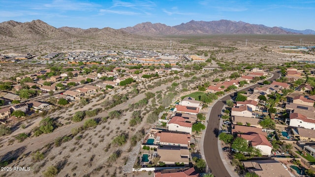 17562 W Desert Sage Dr, Goodyear, AZ 85338 - aerial overview of property's location with a mountain backdrop and nearby suburban area