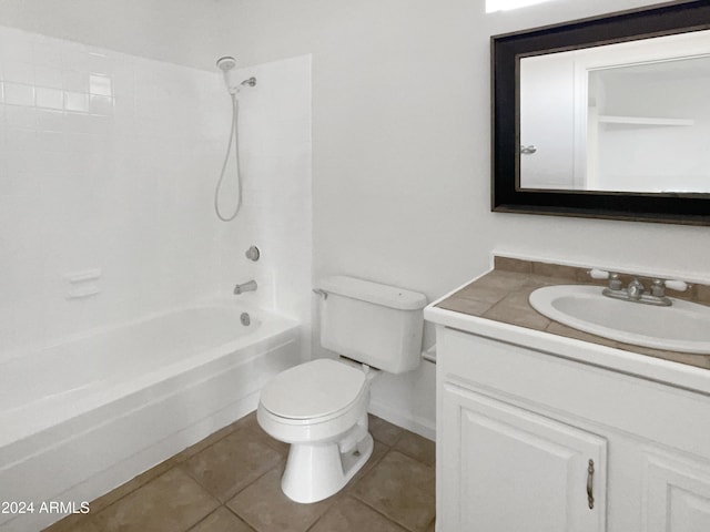 full bathroom featuring tile patterned flooring, vanity, toilet, and shower / washtub combination