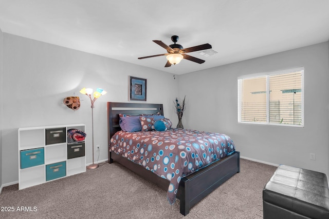 bedroom with visible vents, carpet floors, and baseboards