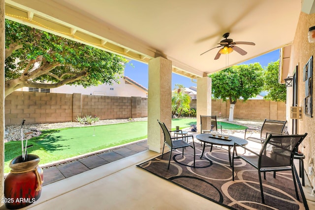 view of patio / terrace featuring a ceiling fan and a fenced backyard