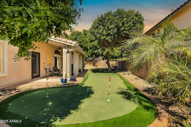 view of yard featuring a patio area and a fenced backyard