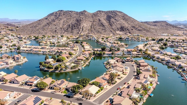 aerial view featuring a residential view and a water and mountain view