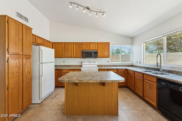 4202 E Brookwood Ct, Phoenix, AZ 85048 - kitchen with black appliances, a sink, lofted ceiling, a center island, and light tile patterned floors