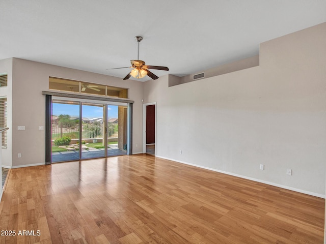 11547 W King Snake Ct, Surprise, AZ 85378 - empty room featuring a ceiling fan, light wood finished floors, and baseboards