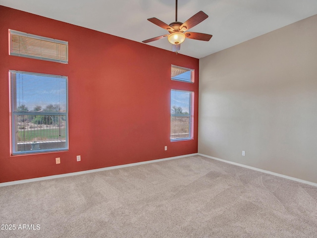 11547 W King Snake Ct, Surprise, AZ 85378 - carpeted empty room featuring plenty of natural light, ceiling fan, and baseboards