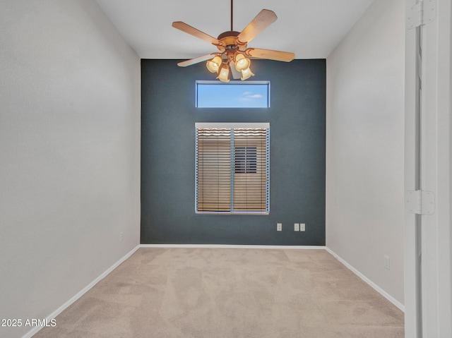 11547 W King Snake Ct, Surprise, AZ 85378 - carpeted empty room with a ceiling fan and baseboards