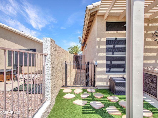 11547 W King Snake Ct, Surprise, AZ 85378 - view of yard featuring a gate and a hot tub