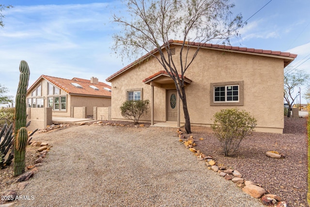 view of front of home with a patio area