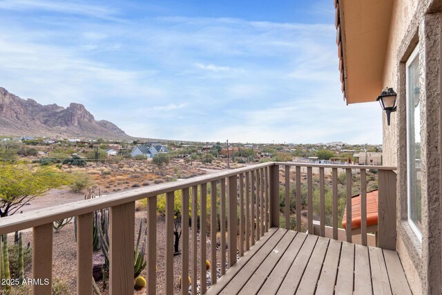 balcony featuring a mountain view