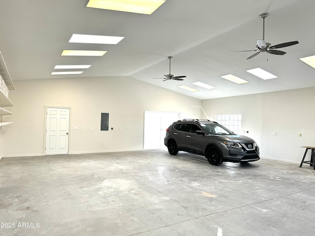 garage with ceiling fan and electric panel