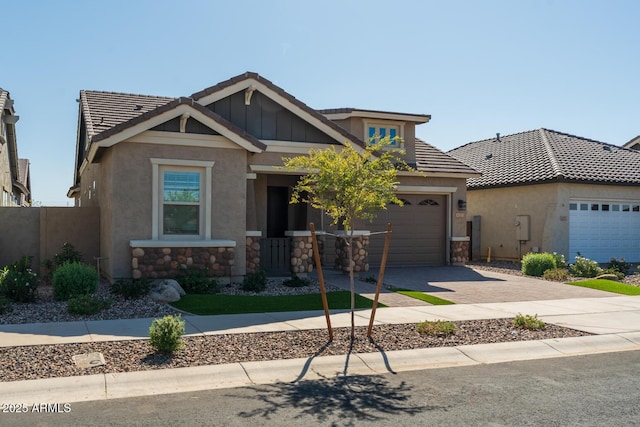 view of front of property with a garage