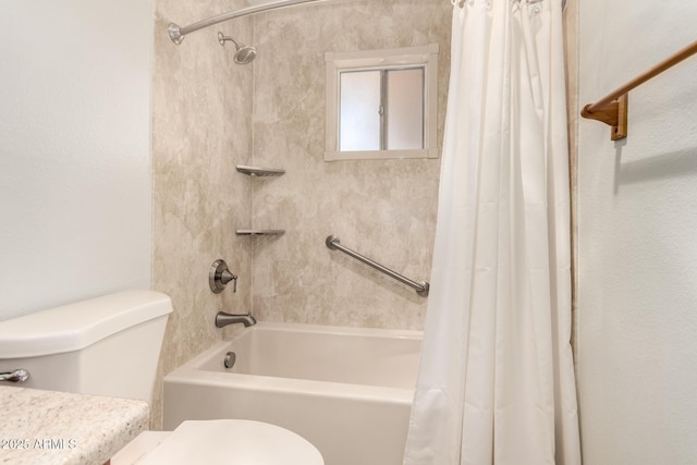 full bathroom featuring shower / bath combo with shower curtain and toilet