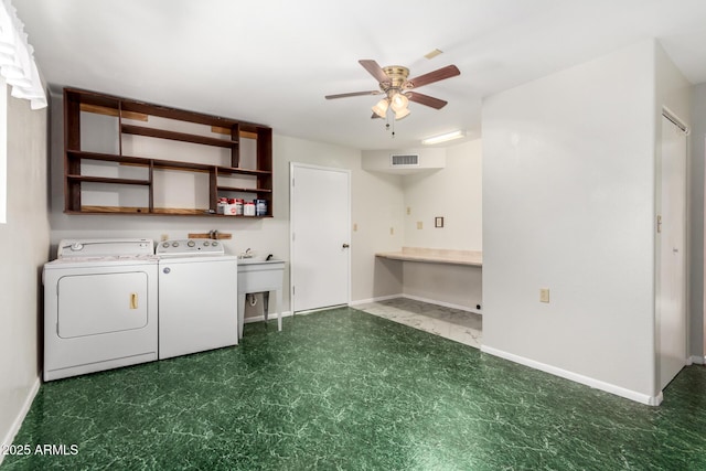 washroom featuring washer and clothes dryer, visible vents, a ceiling fan, baseboards, and tile patterned floors