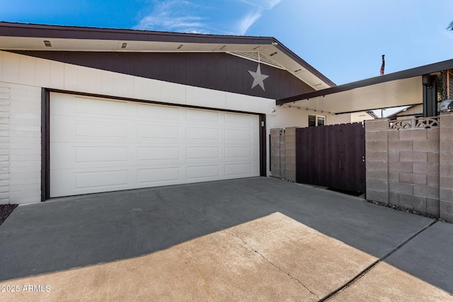 garage featuring fence