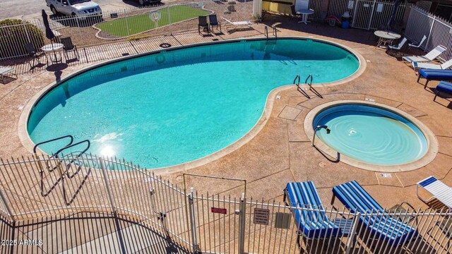 131 N Higley Rd Unit 117, Mesa, AZ 85205 - community pool with a patio area and a community hot tub