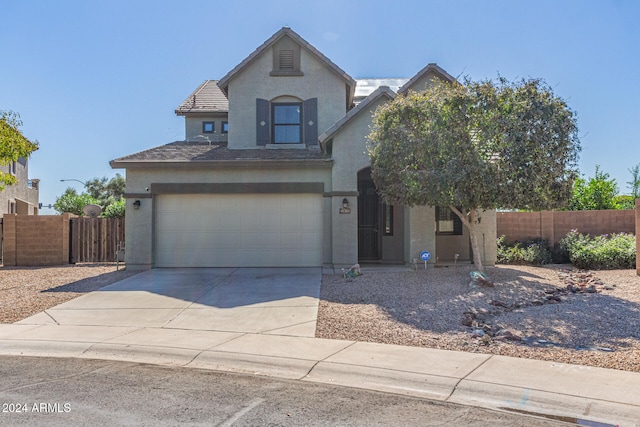 view of front of home with a garage